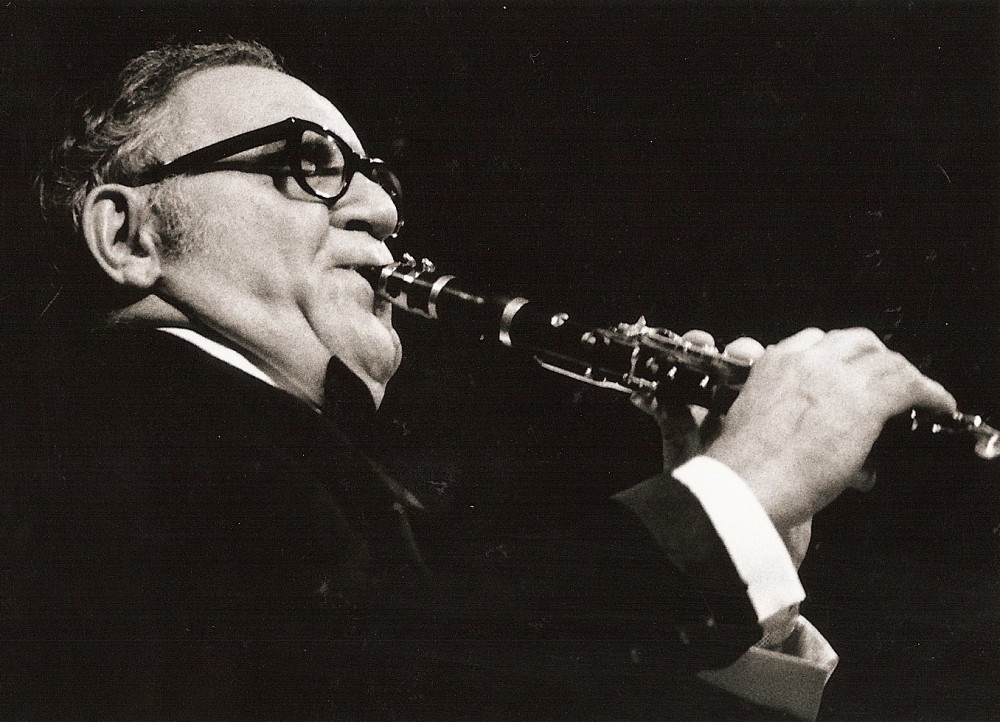 Benny Goodman on stage playing the trumpet